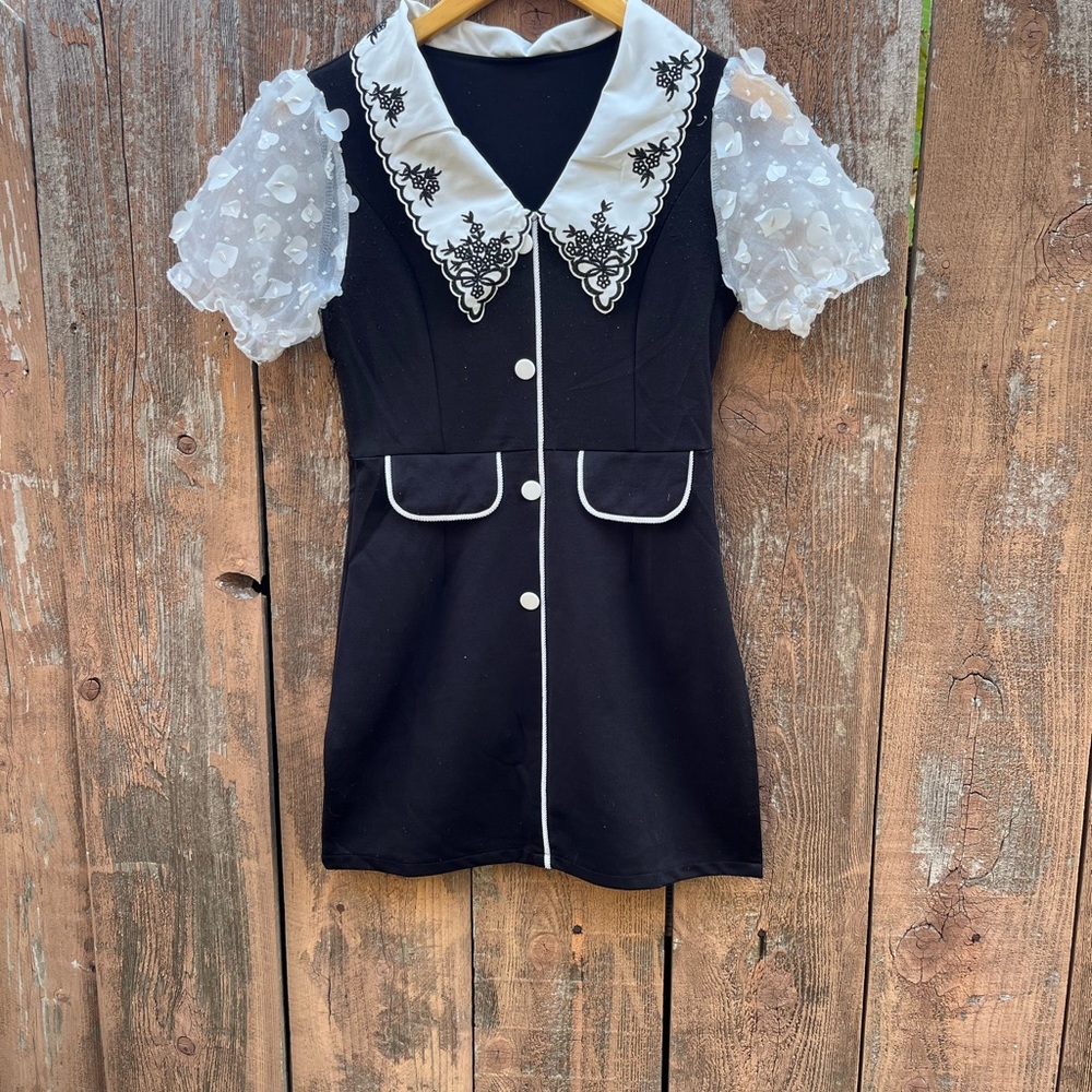 Black Dress with White Lace Collar and Puff Sleeves